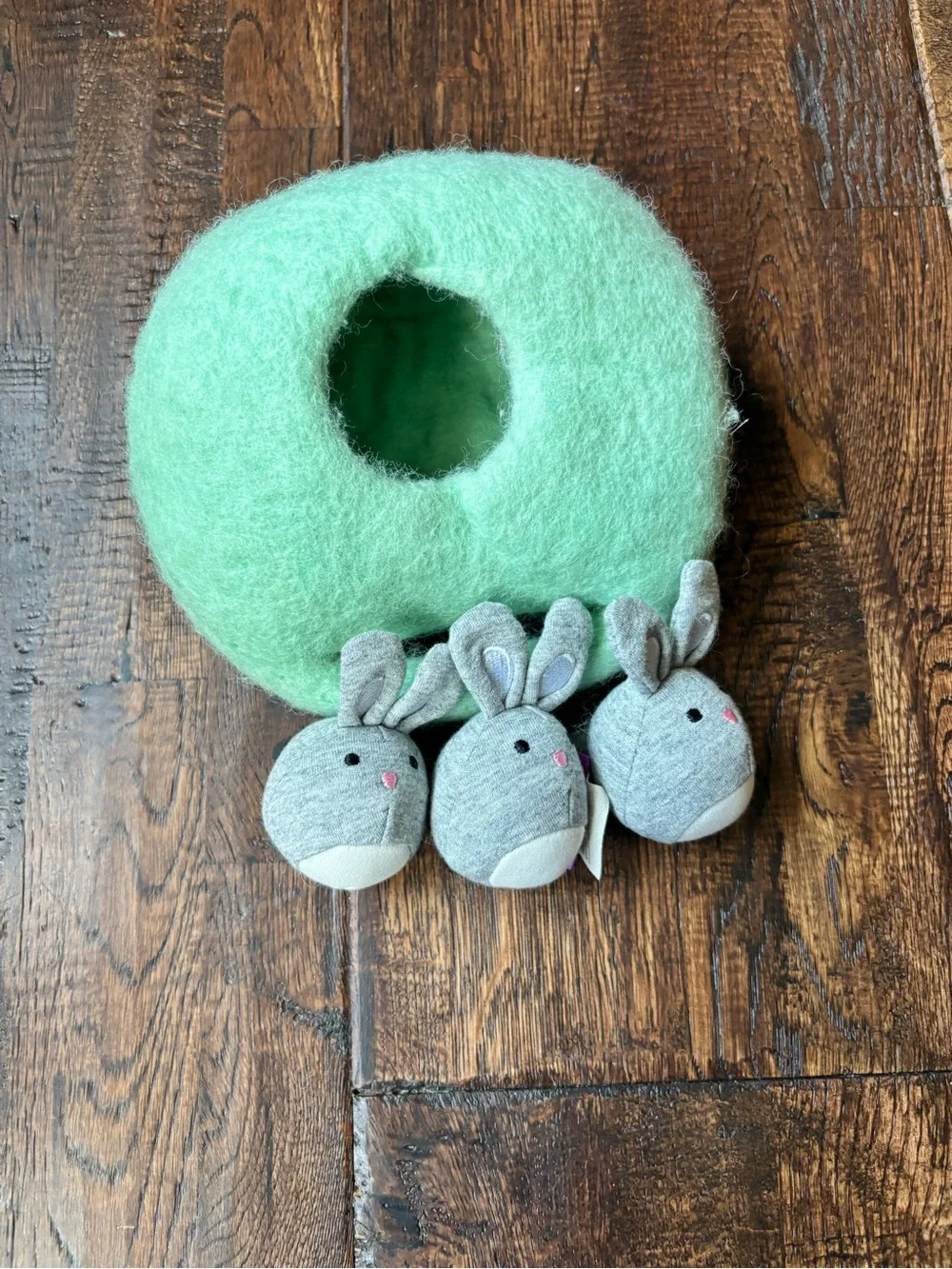 Lovevery bunnies in a felt burrow babbler play kit